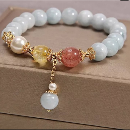 إسوارة أنيقة و راقية من حجر الأكوامارين الطبيعي للهدوء حجر السيترين الطبيعي للوفرة  حجر  الستراوبيري كوارتز الطبيعي للمحبة و الثقة بالنفس والجوهر الأبيض الفاخر