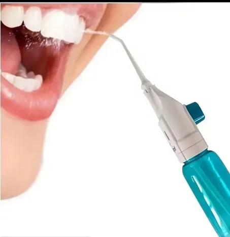 جهاز تنظيف الأسنان بالماء (فلوس مائي)