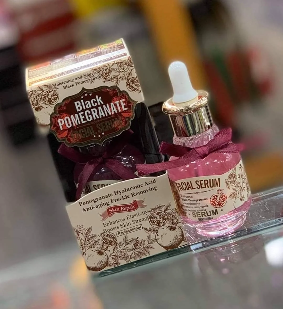 سيروم غني بمستخلص الرمان الأسود وحمض الهيالورونيك