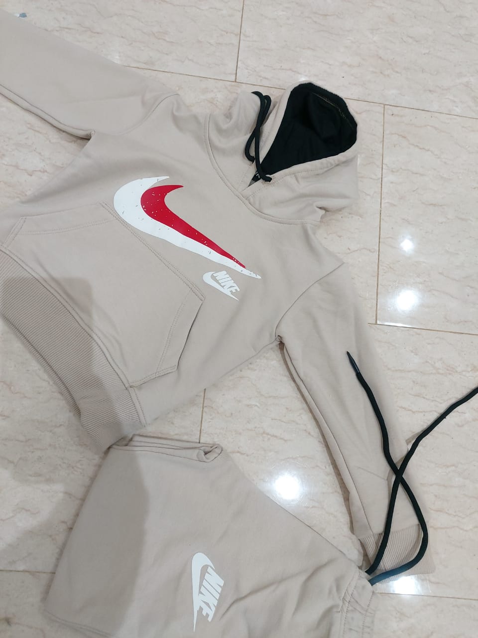 لباس اطفال ذات طبعة nike