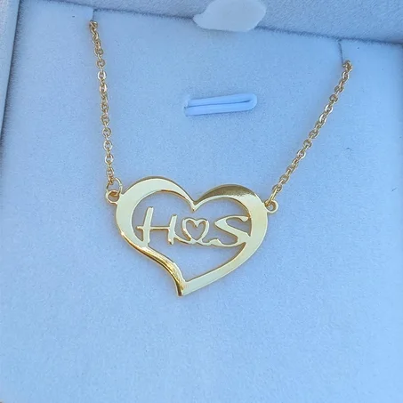 Cœur avec lettre personnalisée dorée