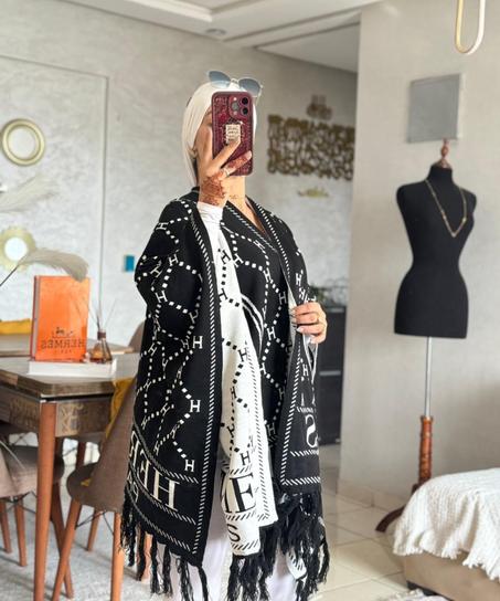 كاب الشتا الطويل.. الدفء والأناقة لي كتقلبو عليها!