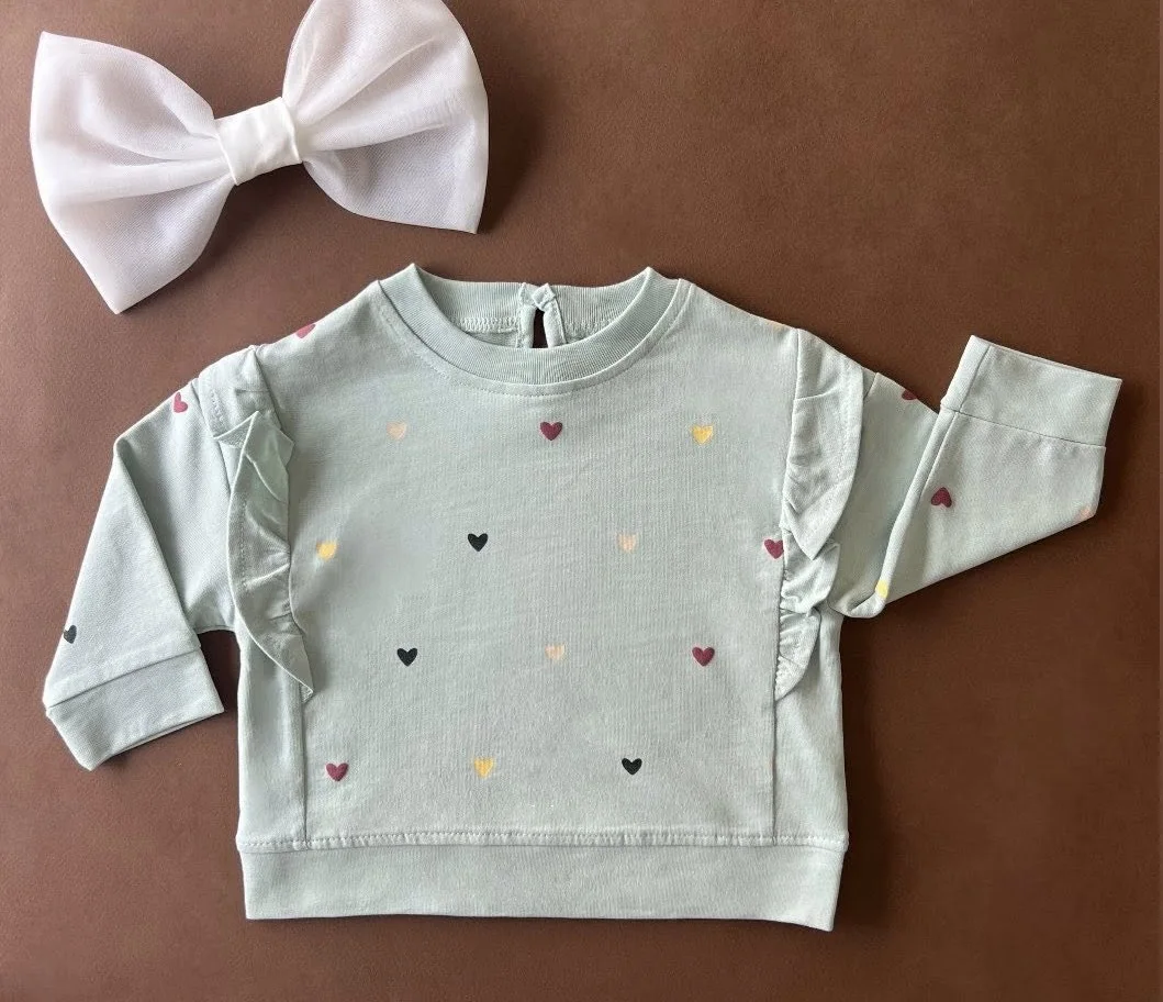 T-shirt "petits cœurs" pour les filles