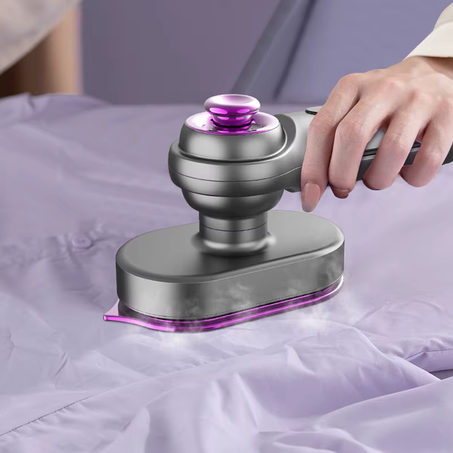 ‏مكواة البخار المحمولة