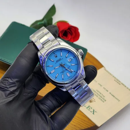 Montre de Luxe Rolex Oyster Perpetual - Cadran Bleu Turquoise