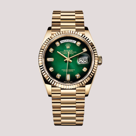 Rolex Day-Date 36 en or jaune 18 ct avec un cadran vert.