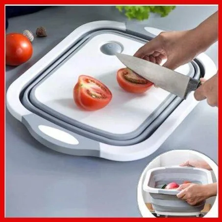 The vegetable cutting board folds and the wash basin at the same time