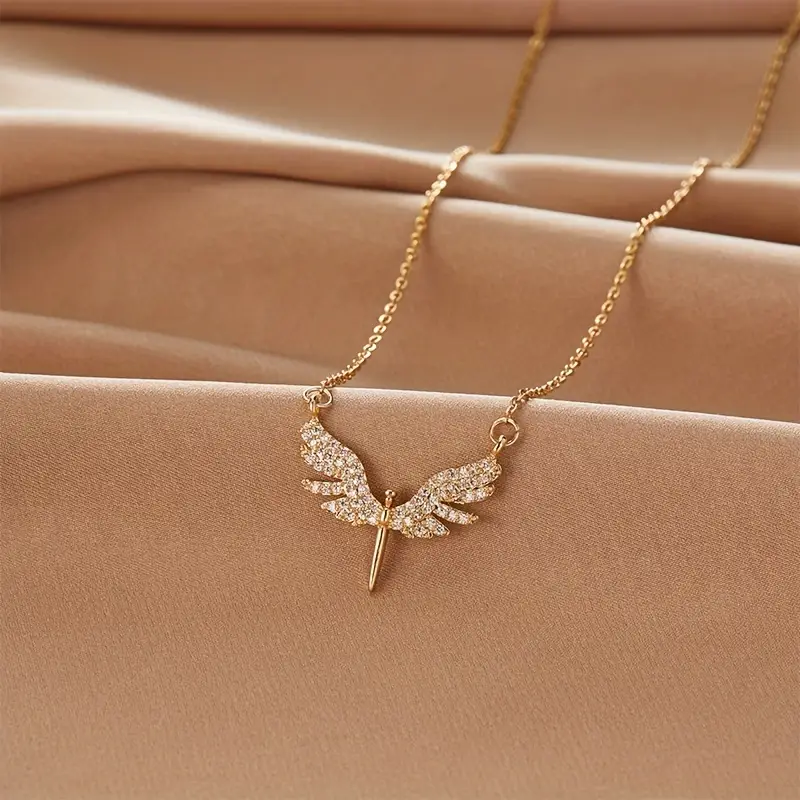 Pendentif ailes d’ange femme – Doré avec zircone
