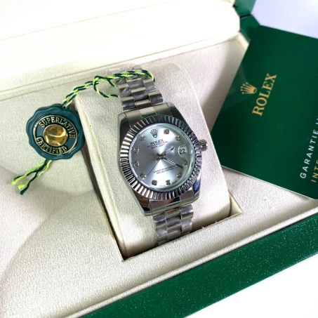 Rolex Date Just + Coffret Carlotta