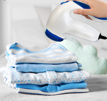 الة ازالة الوبر من الملابس