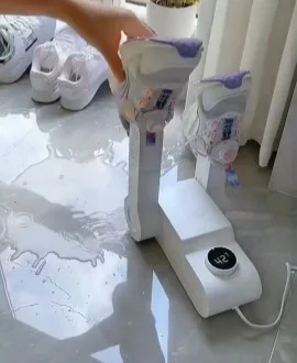 معقم ومجفف الأحذية الكهربائي Shoes Dryer With Sterilization System
