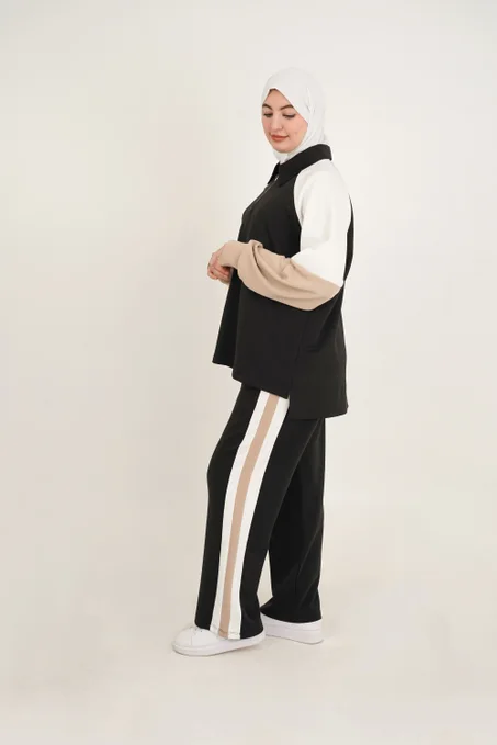 طقم نسائي سبور محتشم بخطوط جانبية  ستايل عملي وراحة يومية