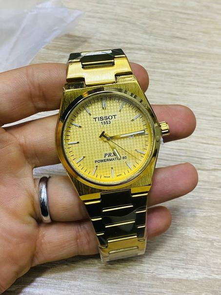Montre Tissot PRX Powermatic en acier doré