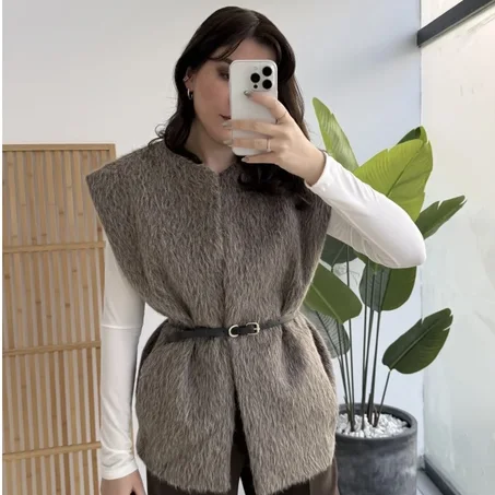 Gilet en fourrure ceinturé