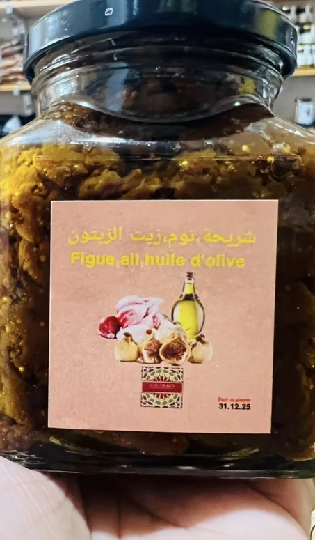 Ail , huile d’olive, figue.        شريحة تومة و زيت الزيتون