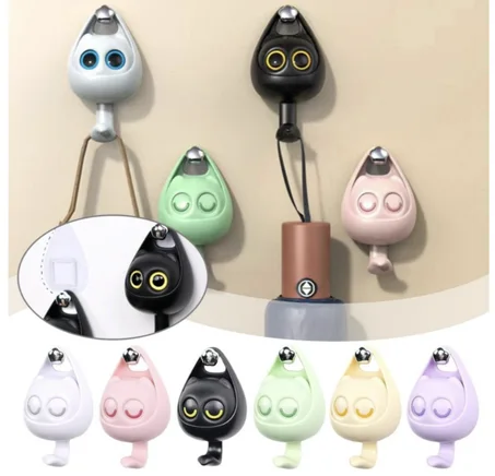 علاقات حائط على شكل قط لطيف يغمز للديكور والتنظيم