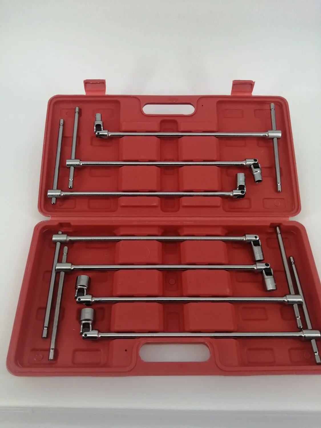 Juego de 7 llaves articuladas Kraftmuller con mango en T y junta universal "larga" para extraer bujías de encendido y bujías incandescentes.