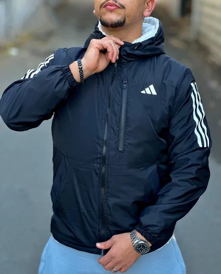 جاكيت باراشوت مبطن بفرُو الخروف ستايل 2026