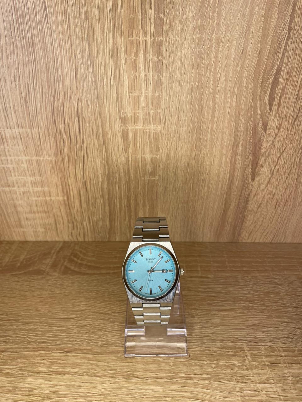 TISSOT ACIER TABLEAU BLEU CIEL