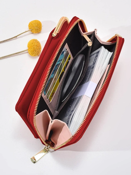 محفظة نسائية أنيقة وعصرية بتصميم عصري وأنيق.