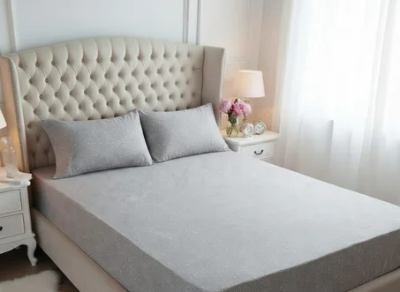 Housse de matelas et 2 oreillers