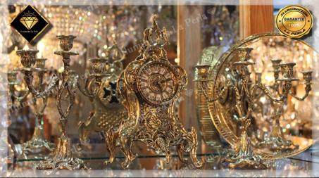 ساعة فاخـرة مع شمعدان