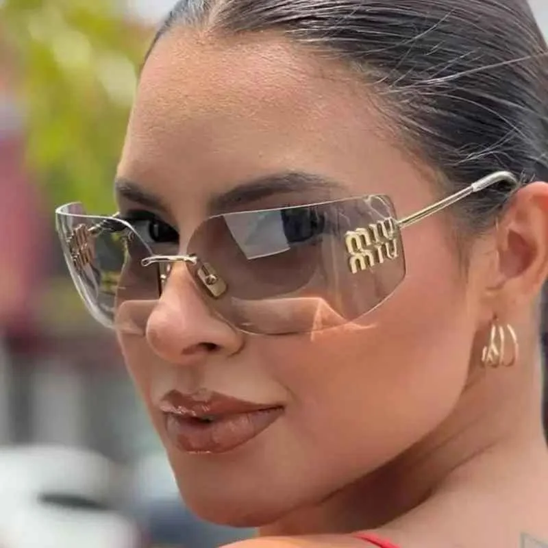 Women’s Futuristic Classic Rimless Gradient Lens Sunglasses – نظارات شمسية نسائية عصرية بدون إطار بعدسات متدرجة اللون