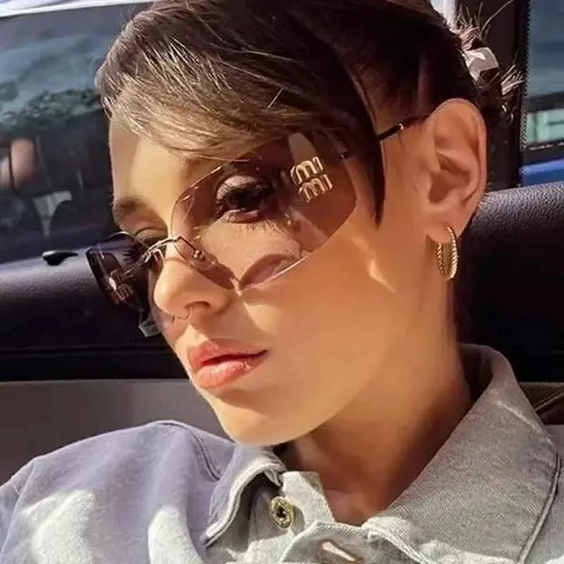 Women’s Futuristic Classic Rimless Gradient Lens Sunglasses – نظارات شمسية نسائية عصرية بدون إطار بعدسات متدرجة اللون