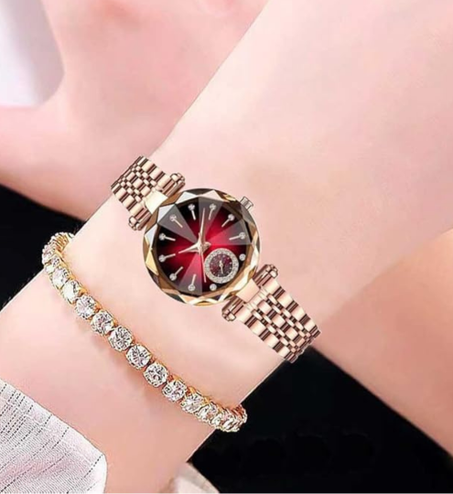 ساعة نسائية بسوار ذهبي وردي