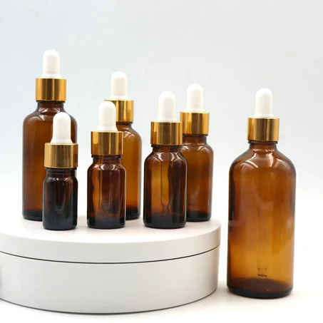 عبوات زجاجية فاخرة بقطّارة لتعبئة الزيوت والسيروم (10ml - 100ml)