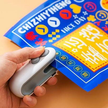 ماكينة غلق الأكياس الصغيرة 2 في 1