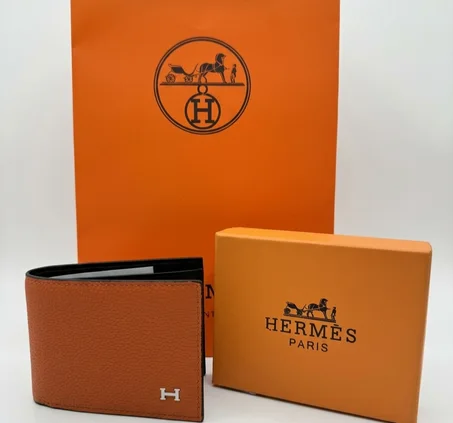 PORTE MONNAIE HEMRES ORANGE HOMMES AVEC SACHET