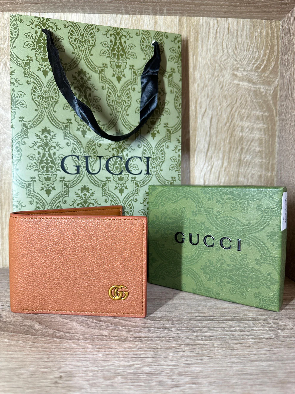 PORTE MONNAIE GUCCI HOMMES MARRON