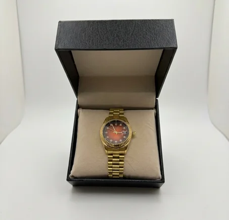 ROLEX FEMMES GOLD/BORDEAUX BOITE SIMPLE