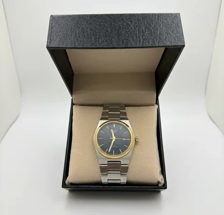 TISSOT HOMMES NOIR/GOLD BOITE SIMPLE