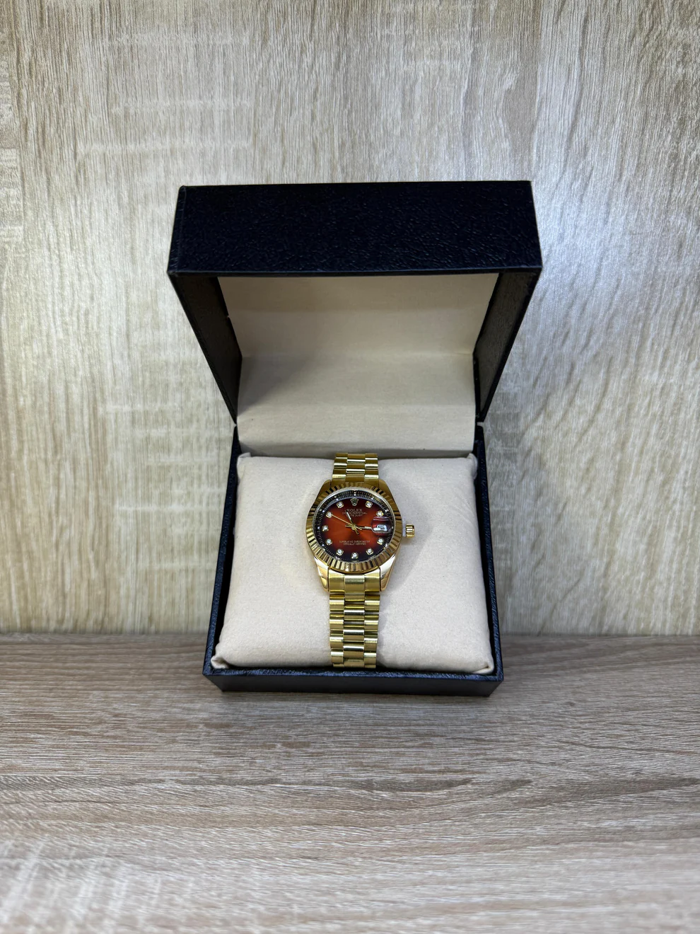 ROLEX FEMMES GOLD/BORDEAUX BOITE SIMPLE