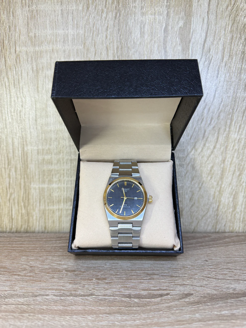 TISSOT HOMMES NOIR/GOLD BOITE SIMPLE