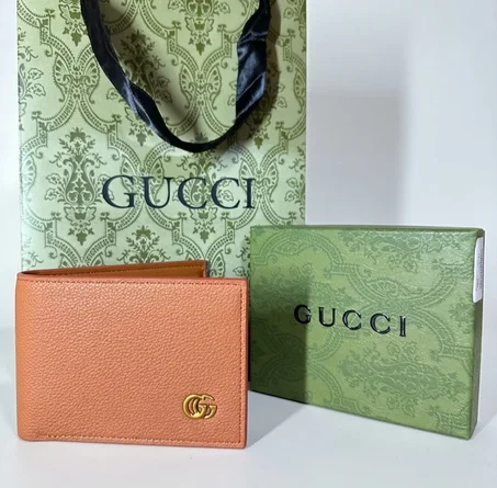 PORTE MONNAIE GUCCI HOMMES MARRON
