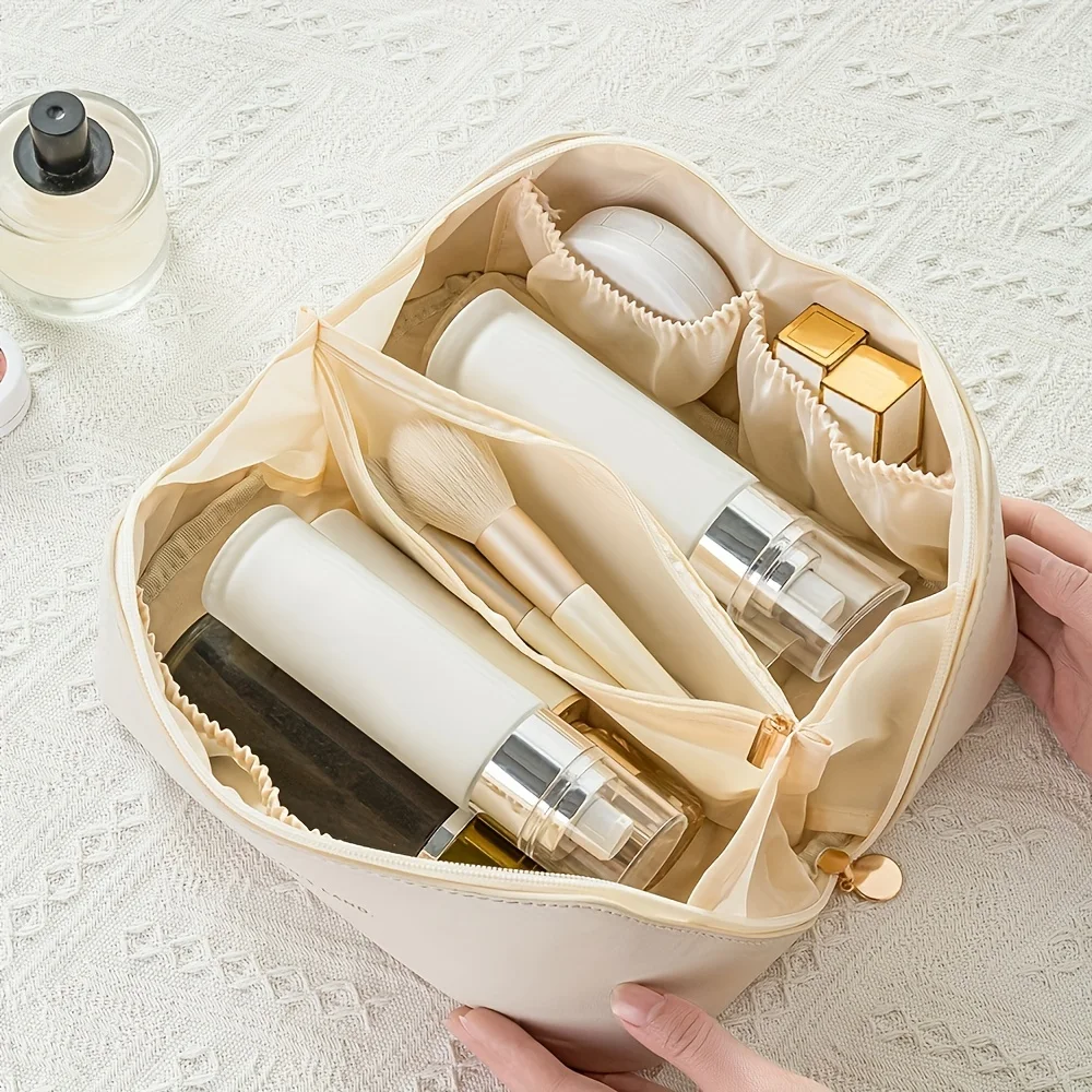 pochette maquiallge        حقيبة المكياج