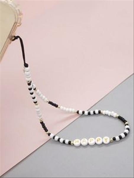 charme de telephone noire et blanc