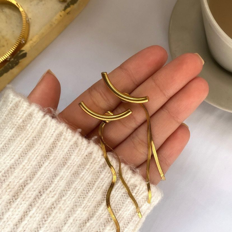 Boucles D'oreilles longues ondulées dorées