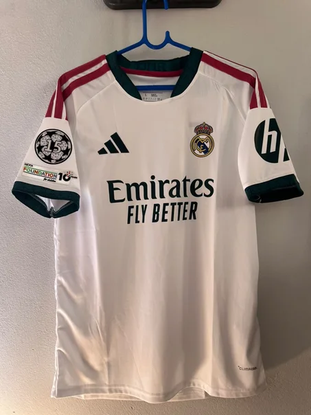 قميص ريال مدريد الرياضي – Real Madrid Jersey 26/27 (version fan)