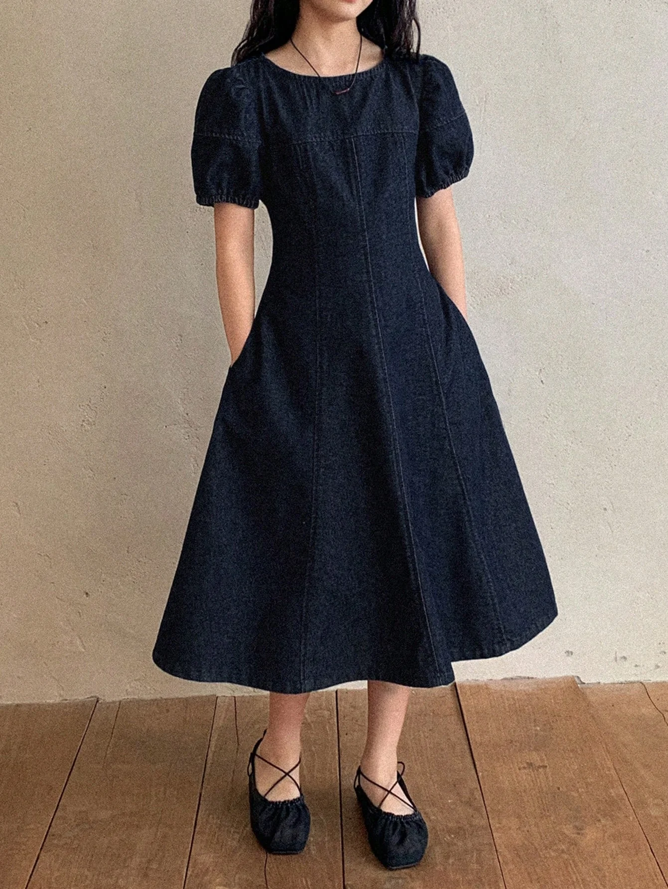 Excellent quality denim clothing in dark blue and black, modern and suggesting elegance and a touch of luxury for young girls, suitable for school, outings, family events, and public occasion