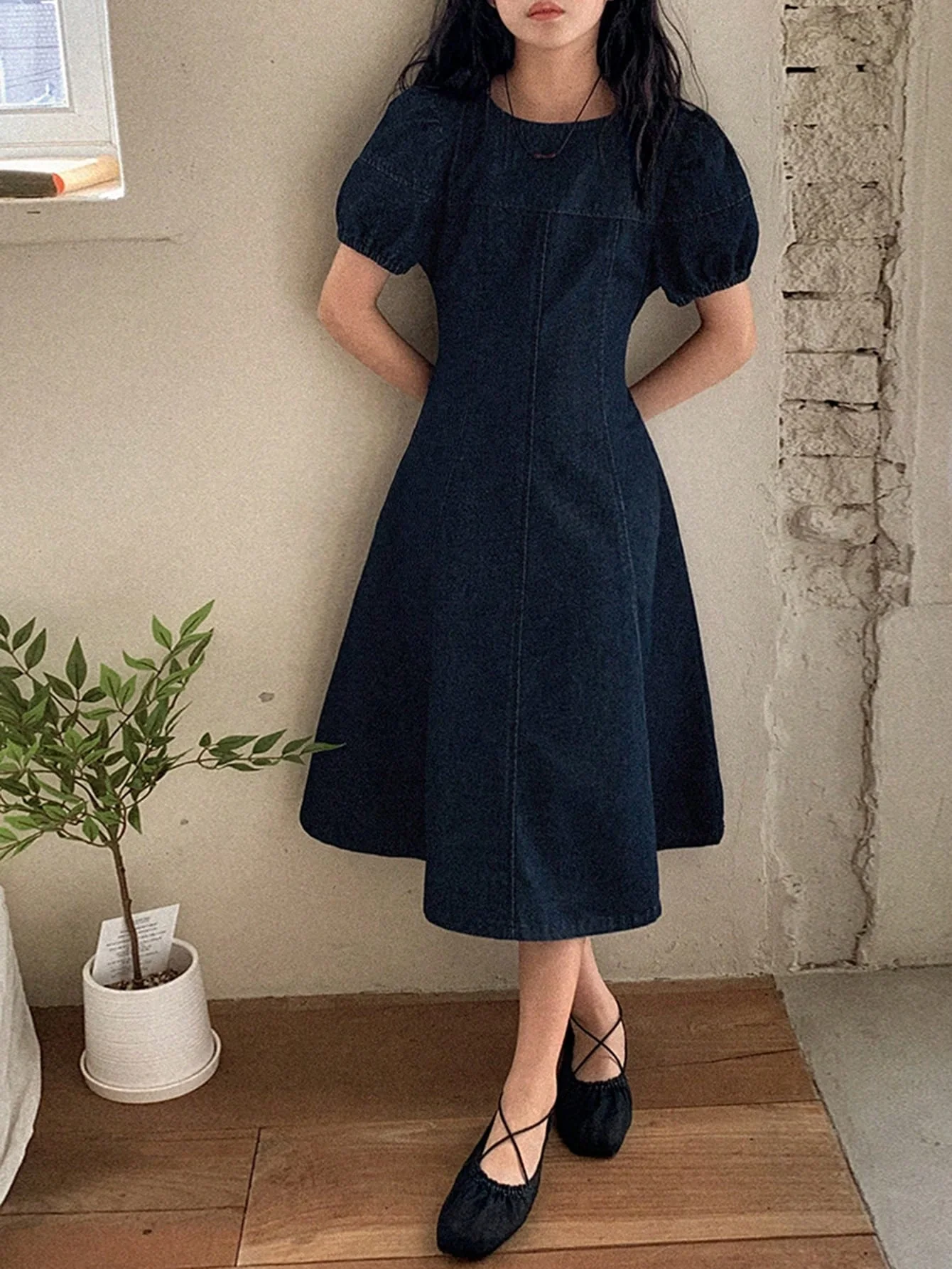 Excellent quality denim clothing in dark blue and black, modern and suggesting elegance and a touch of luxury for young girls, suitable for school, outings, family events, and public occasion