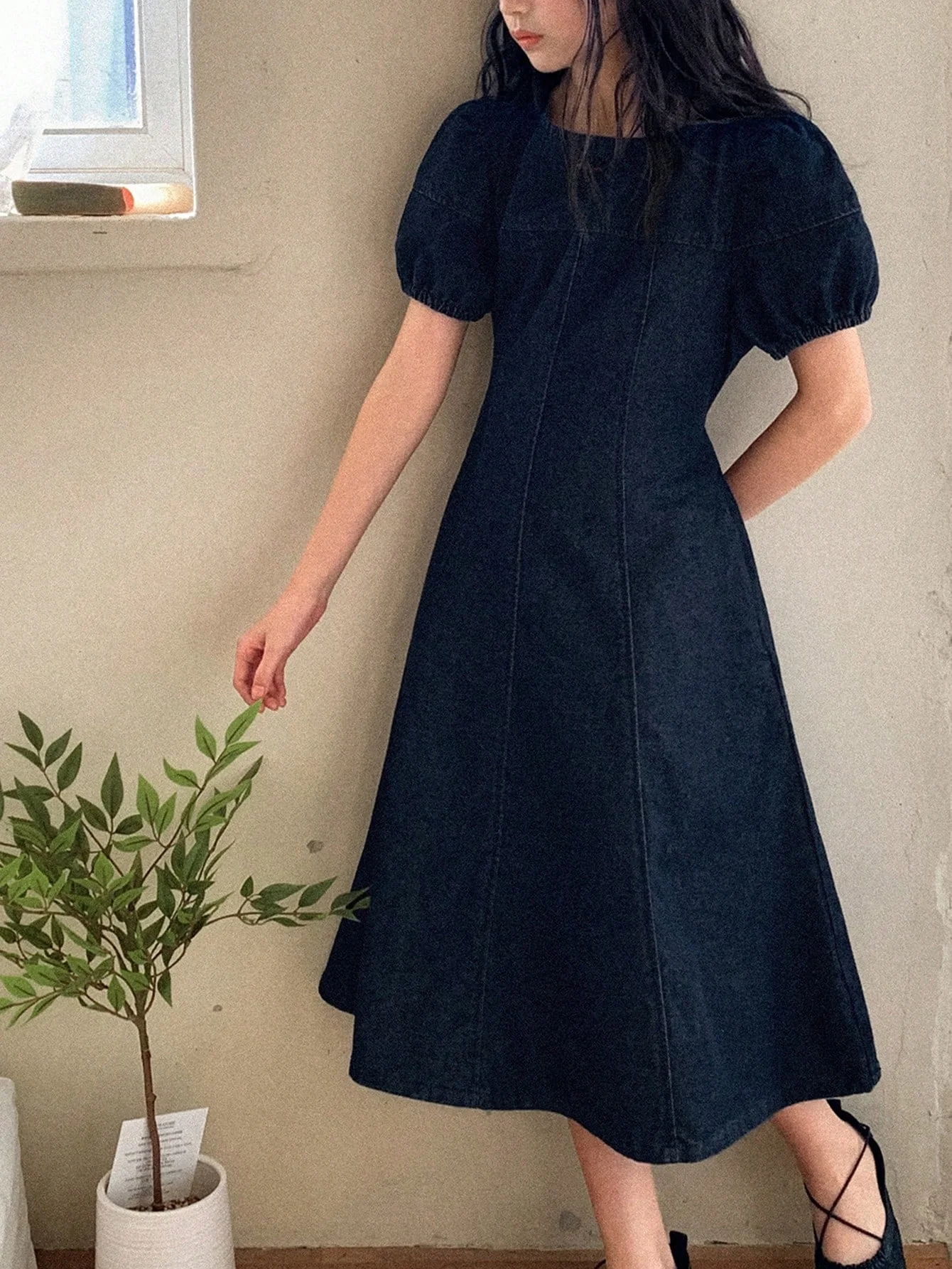 Excellent quality denim clothing in dark blue and black, modern and suggesting elegance and a touch of luxury for young girls, suitable for school, outings, family events, and public occasion
