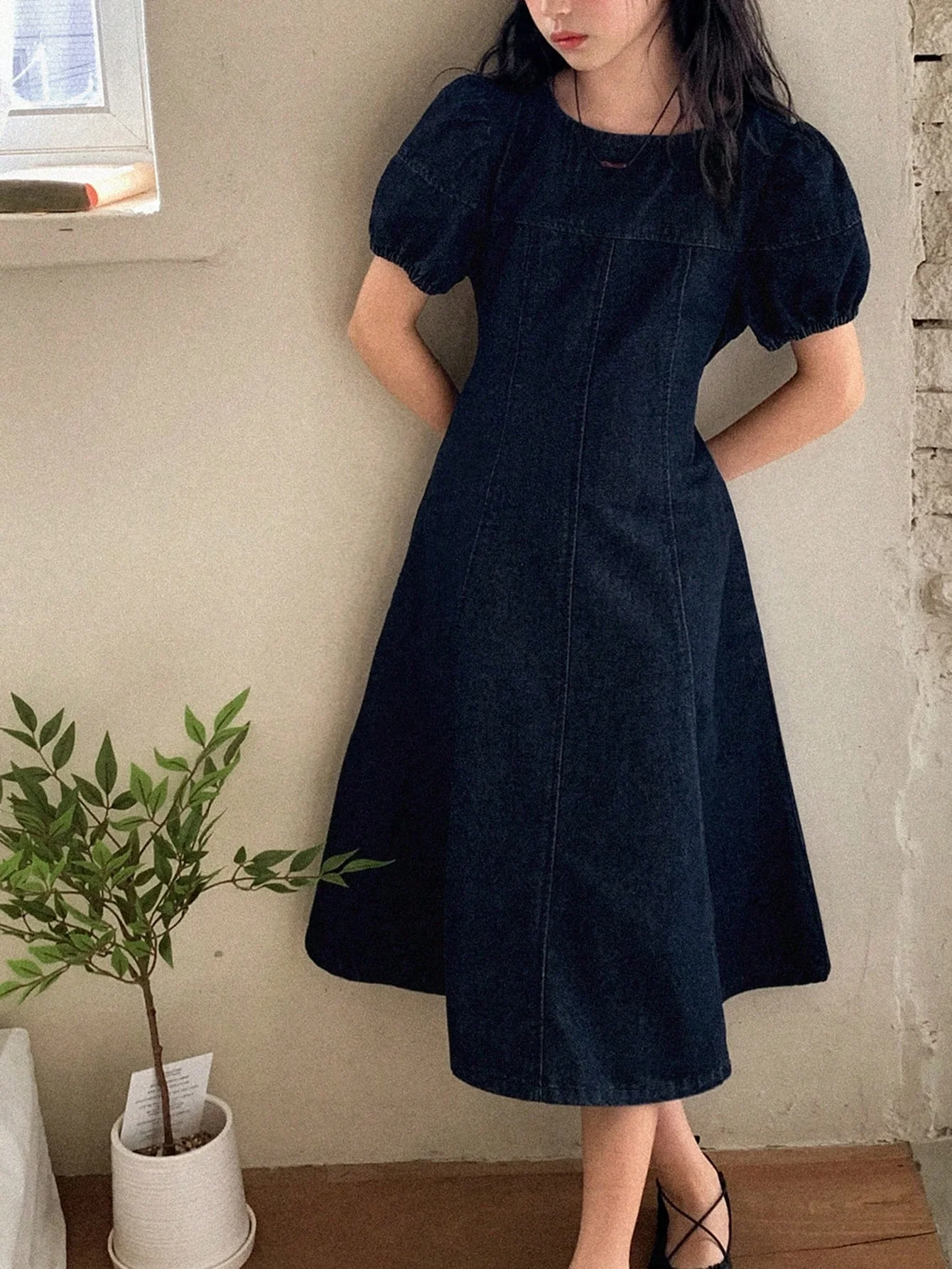Excellent quality denim clothing in dark blue and black, modern and suggesting elegance and a touch of luxury for young girls, suitable for school, outings, family events, and public occasion