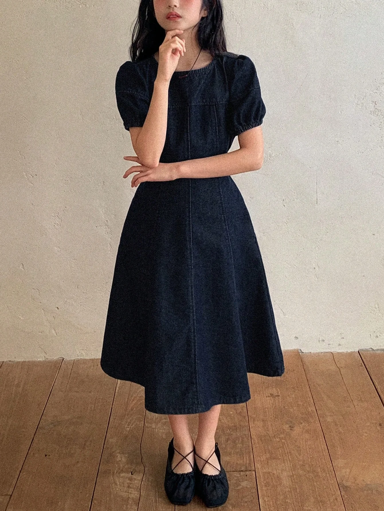 Excellent quality denim clothing in dark blue and black, modern and suggesting elegance and a touch of luxury for young girls, suitable for school, outings, family events, and public occasion