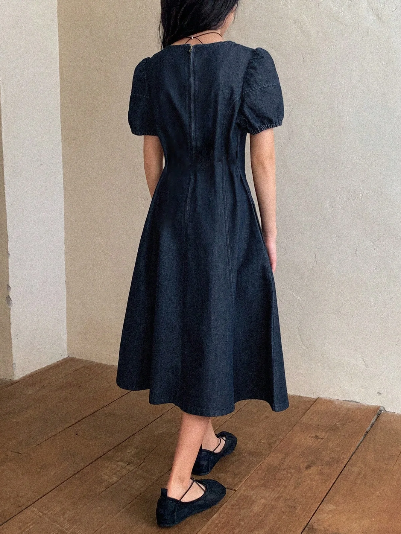 Excellent quality denim clothing in dark blue and black, modern and suggesting elegance and a touch of luxury for young girls, suitable for school, outings, family events, and public occasion