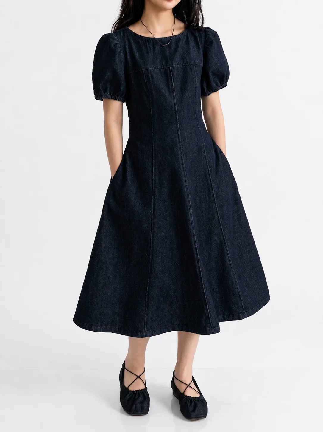 Excellent quality denim clothing in dark blue and black, modern and suggesting elegance and a touch of luxury for young girls, suitable for school, outings, family events, and public occasion