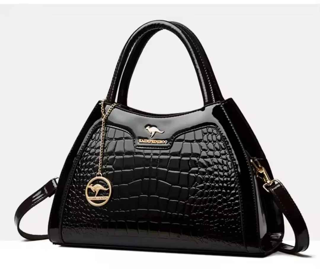 Sac à main luxe effet croco, design chic et intemporel.